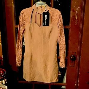 Pink dress with classic cutouts in the front. Never worn. Size small